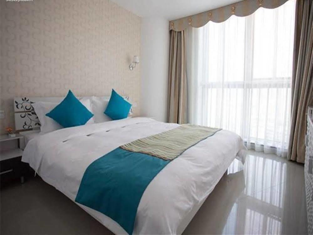 Sanya Shentong Hotel Buitenkant foto