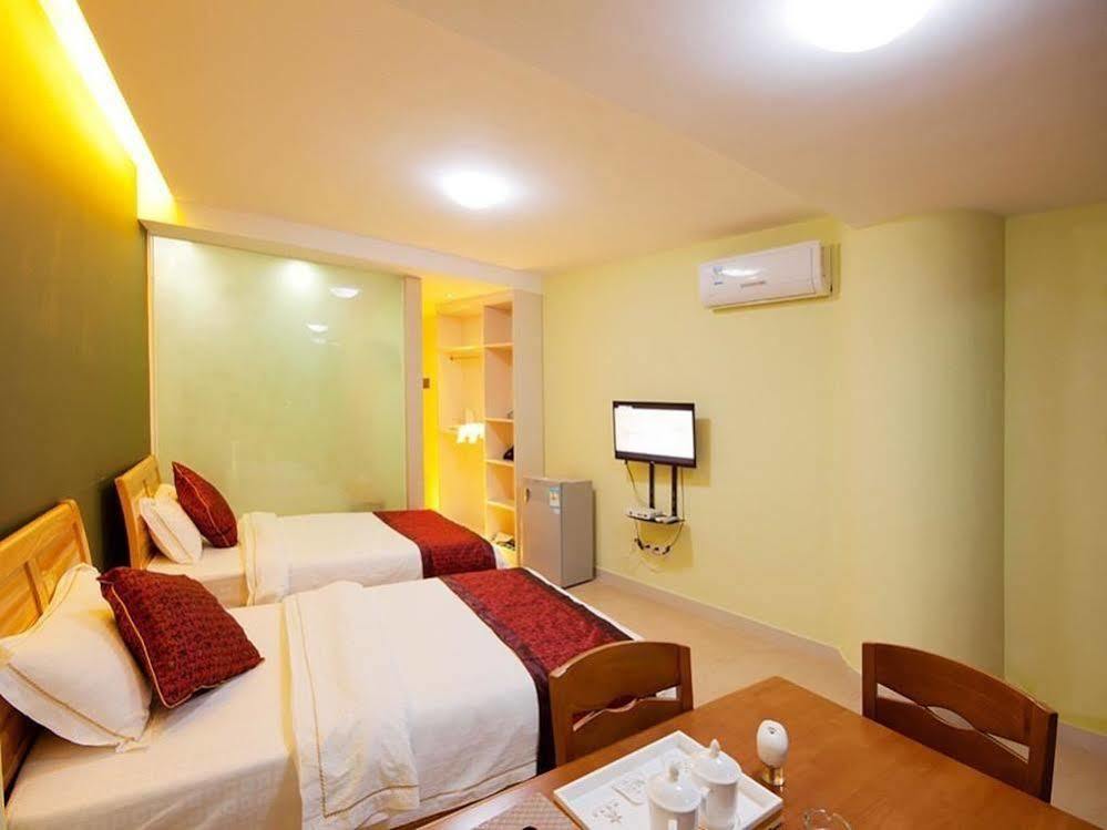Sanya Shentong Hotel Buitenkant foto